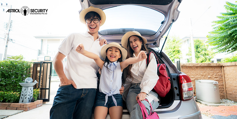 Image of an Asian family smiling and getting ready for a vacation